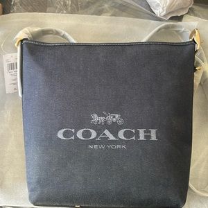 New w/tags Coach Denim and refined pebble leather duffle